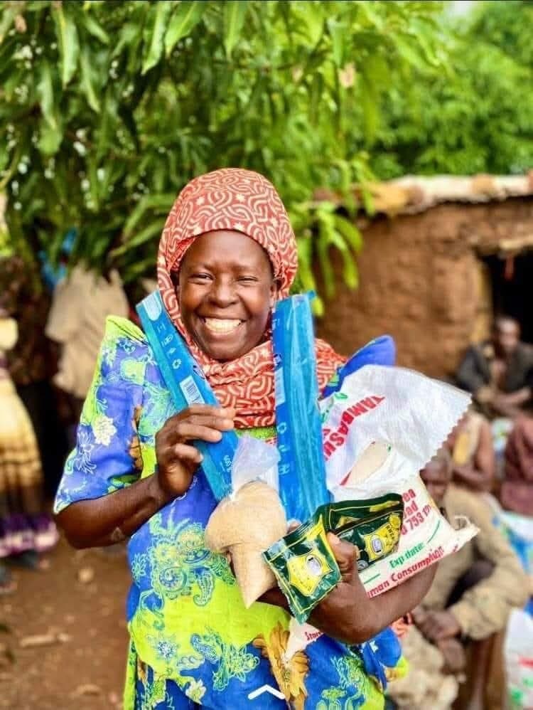 Food packs: Smiling recipient